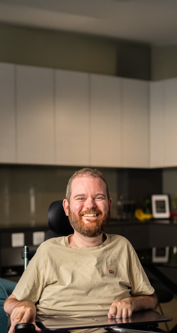Tristram, Aussie Powerchair Team and Plan Partners' Customer